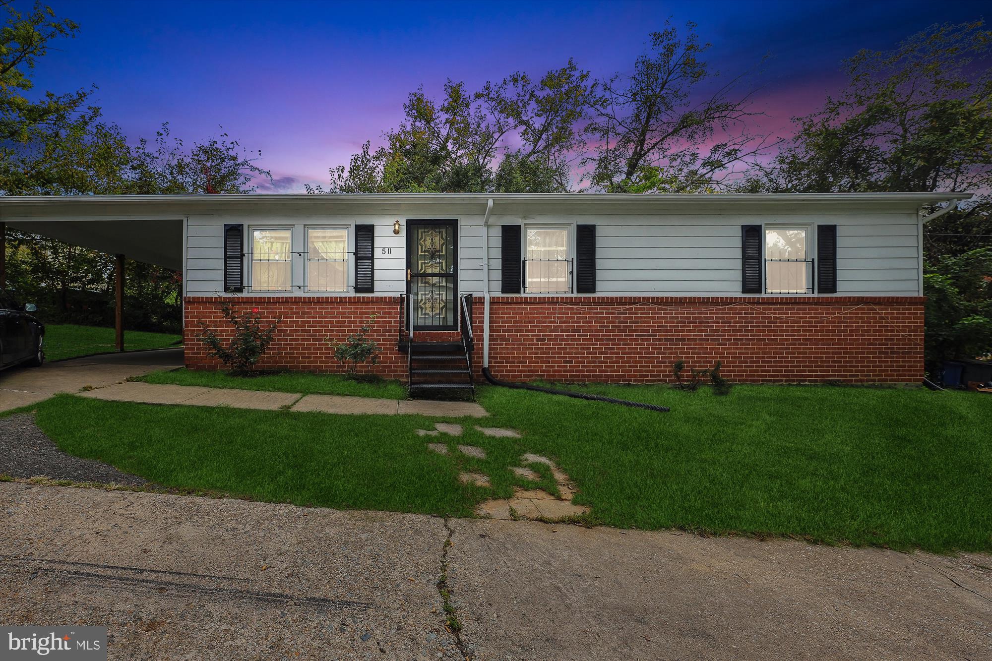 front view of a house with a yard