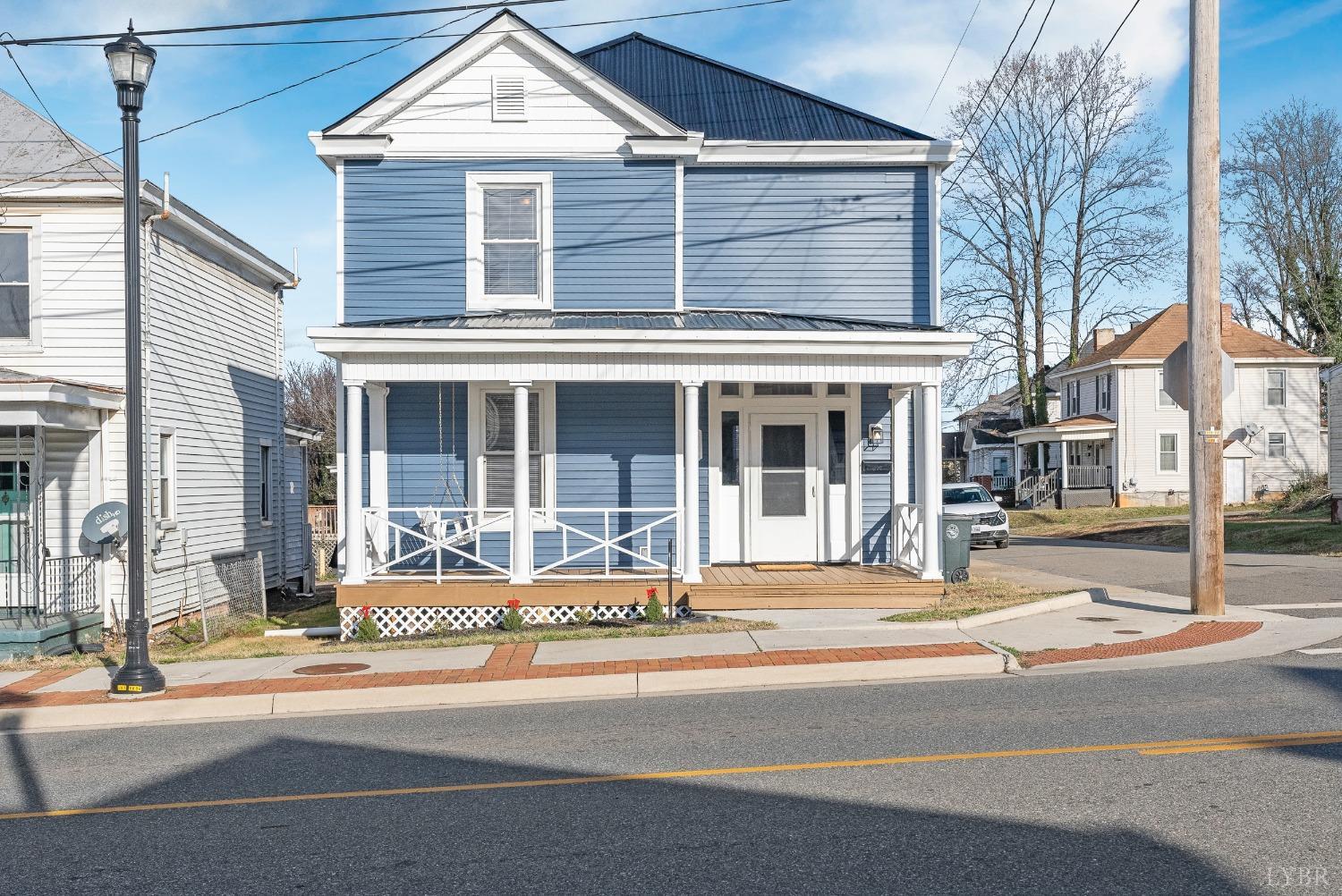 a front view of a building with street view