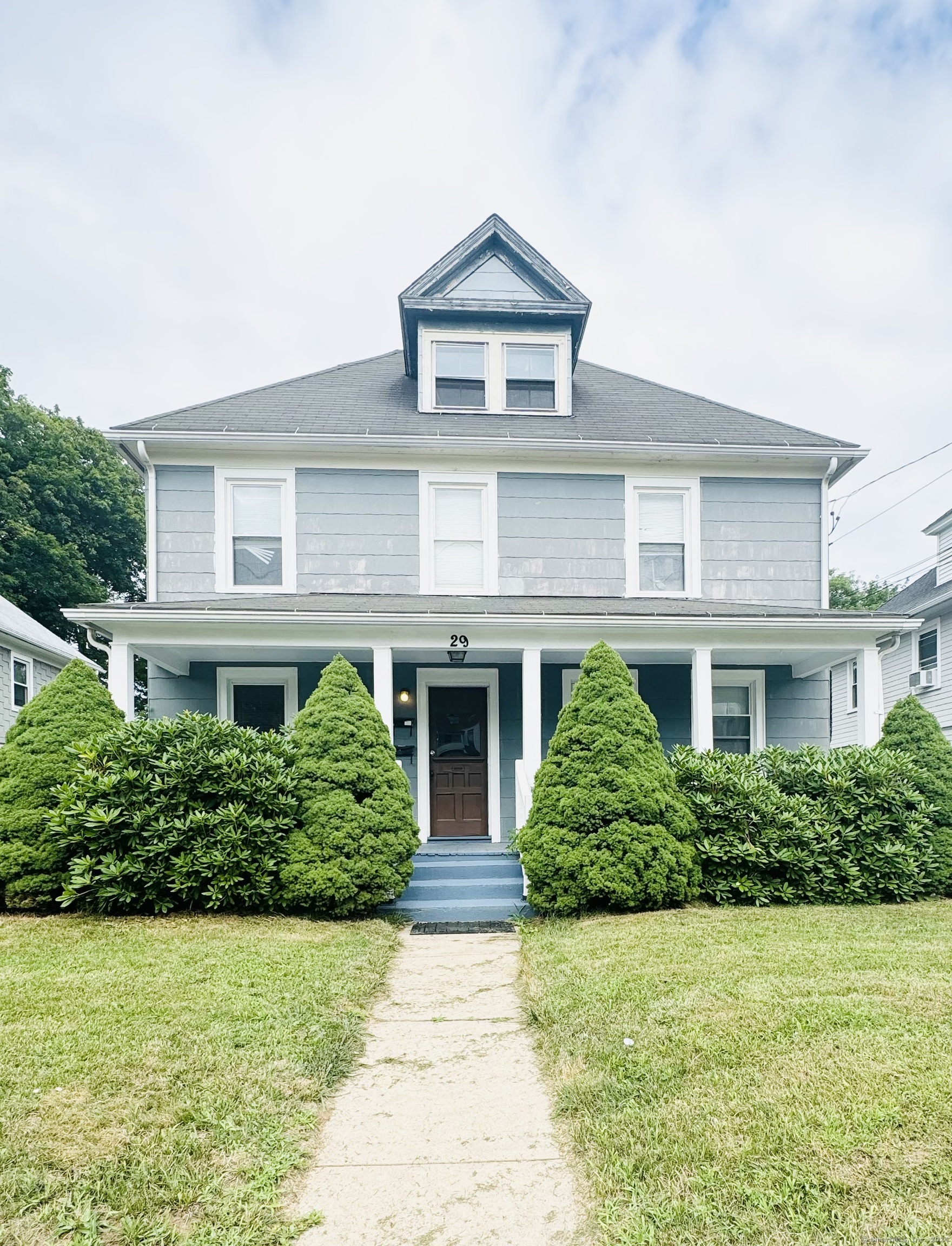 front view of house with a yard