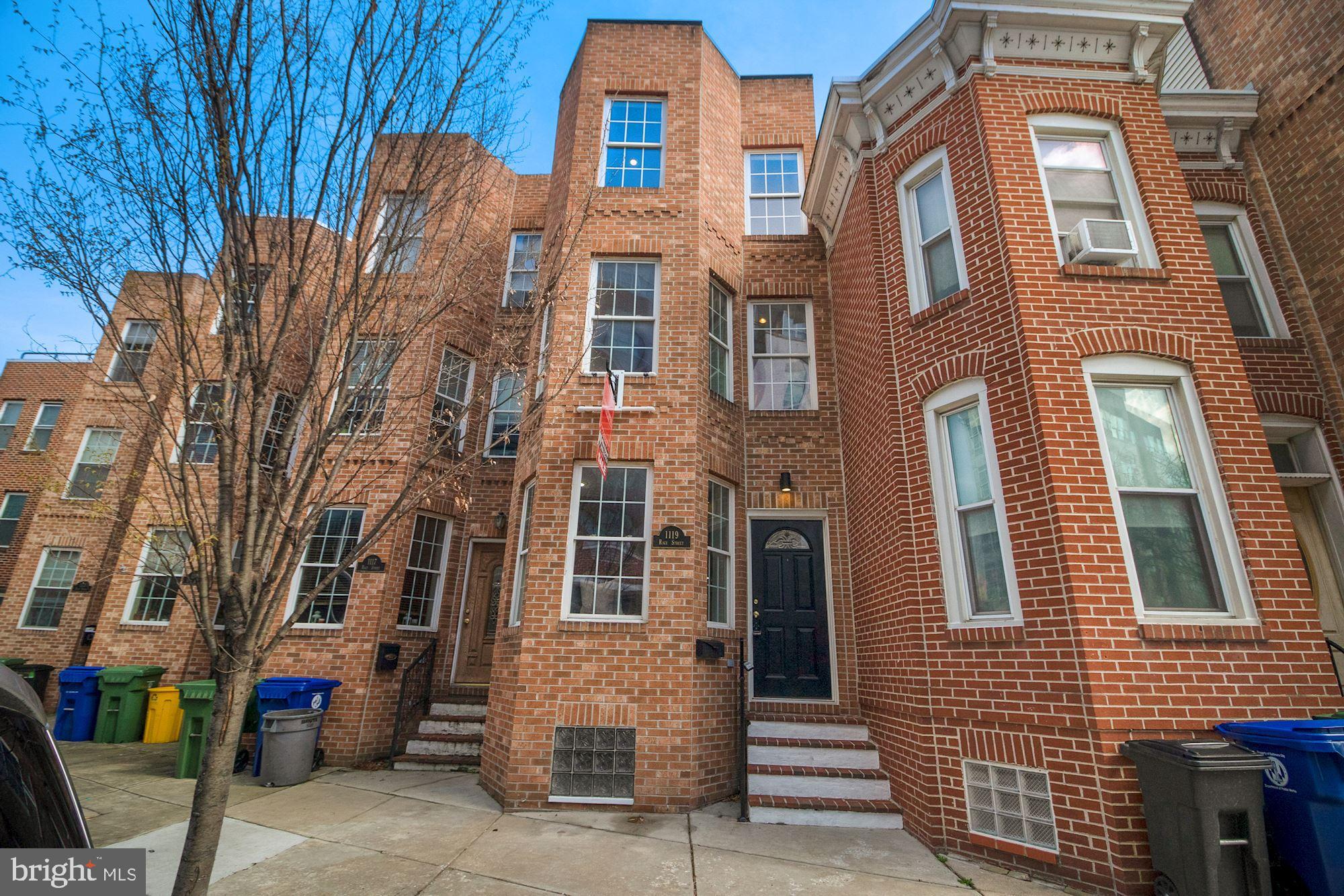 a front view of a multi story residential apartment building