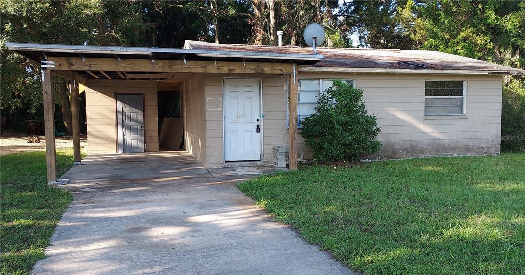 a view of outdoor space yard and front view of a house