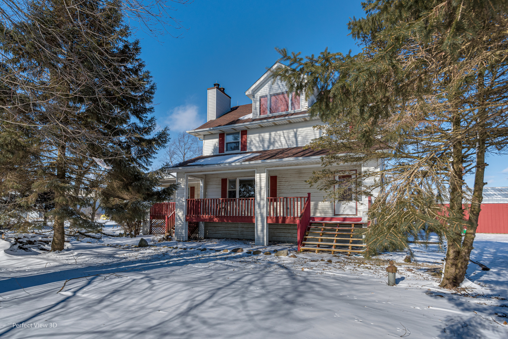 a view of a house with a iron fence