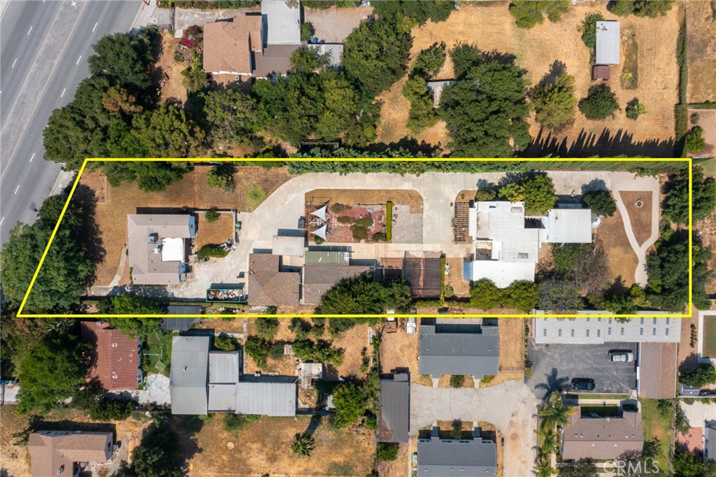 an aerial view of a house with a lake view