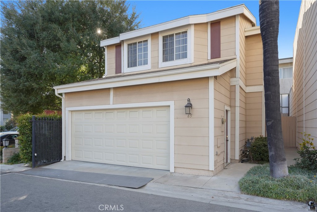 a front view of a house with a garage