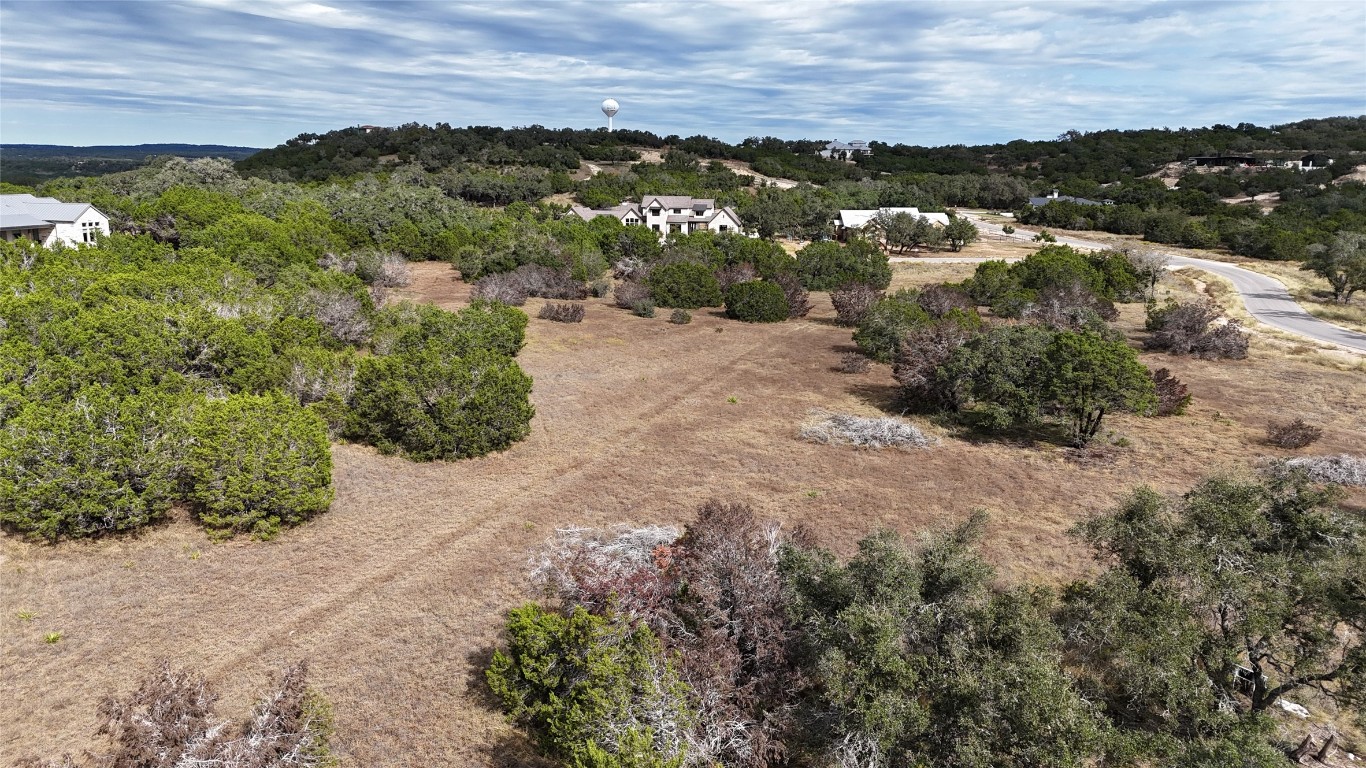 a view of a pathway with a yard