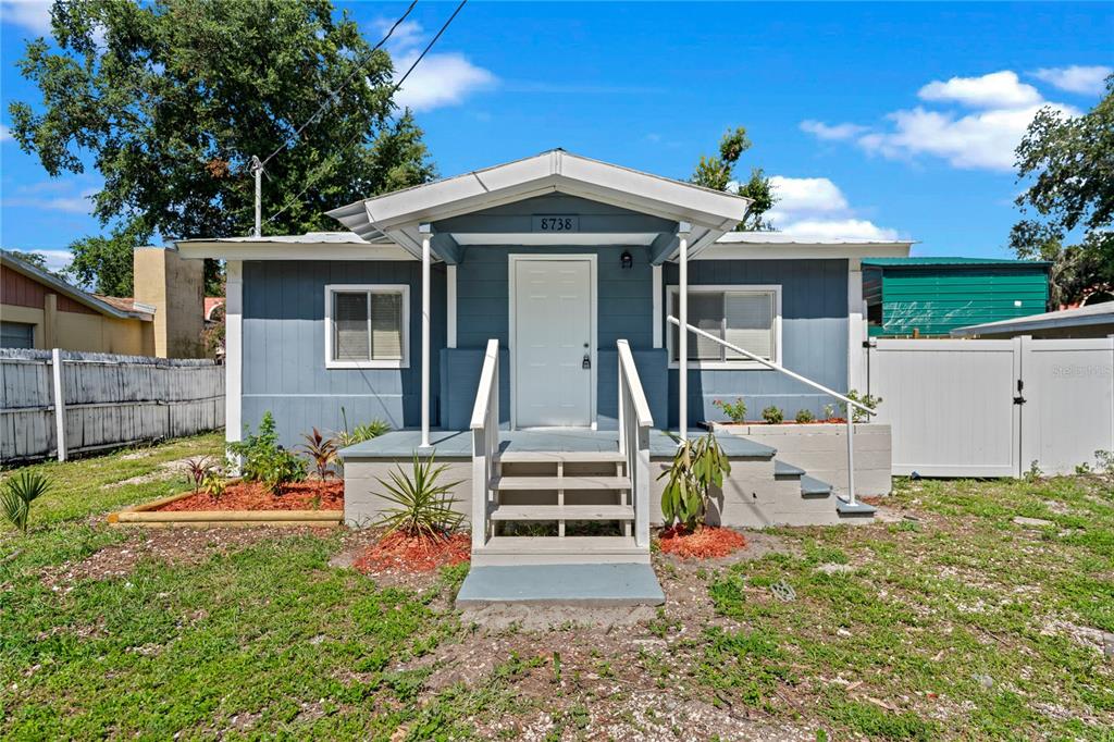 front view of a house with a yard