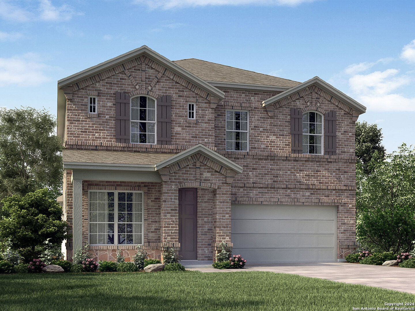 front view of a house with a yard