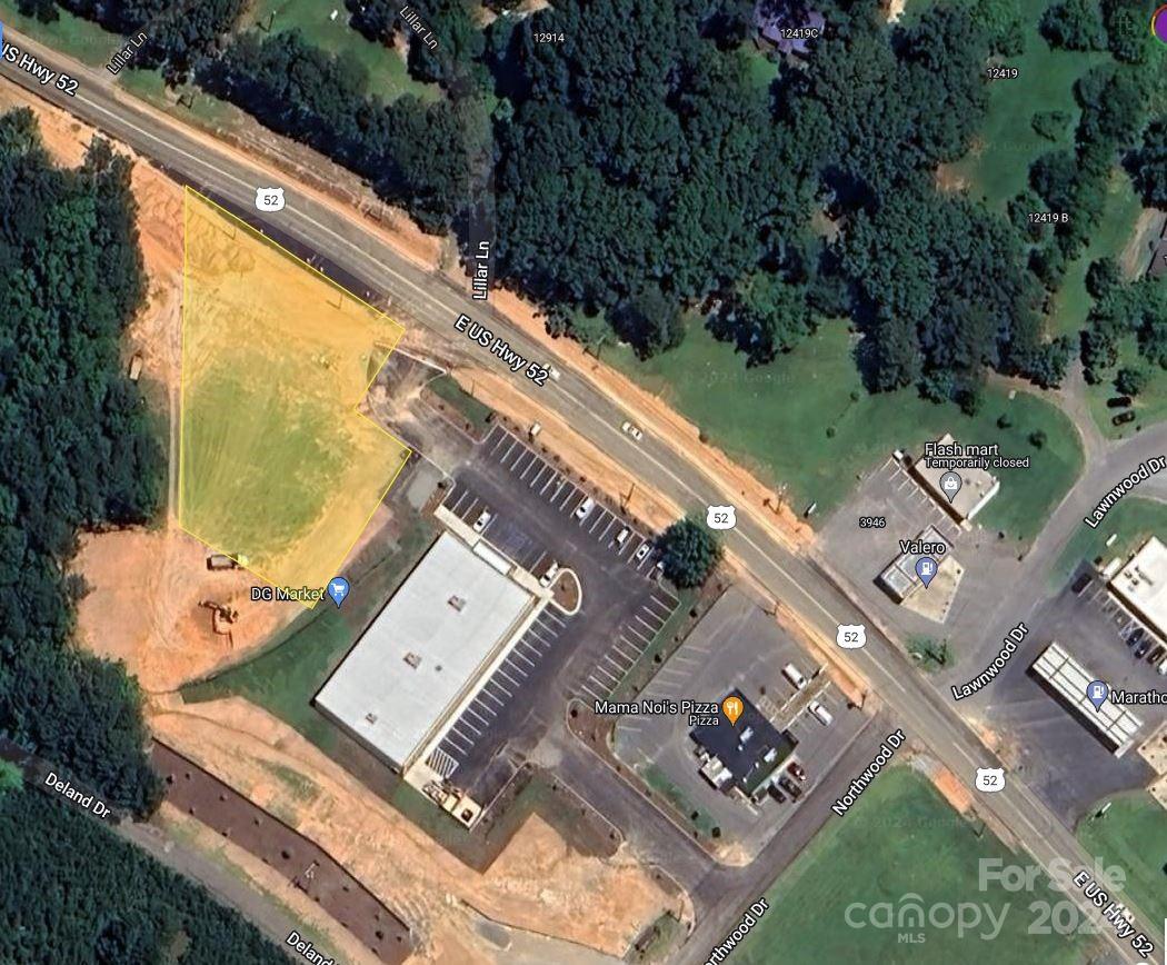 an aerial view of a house with a garden