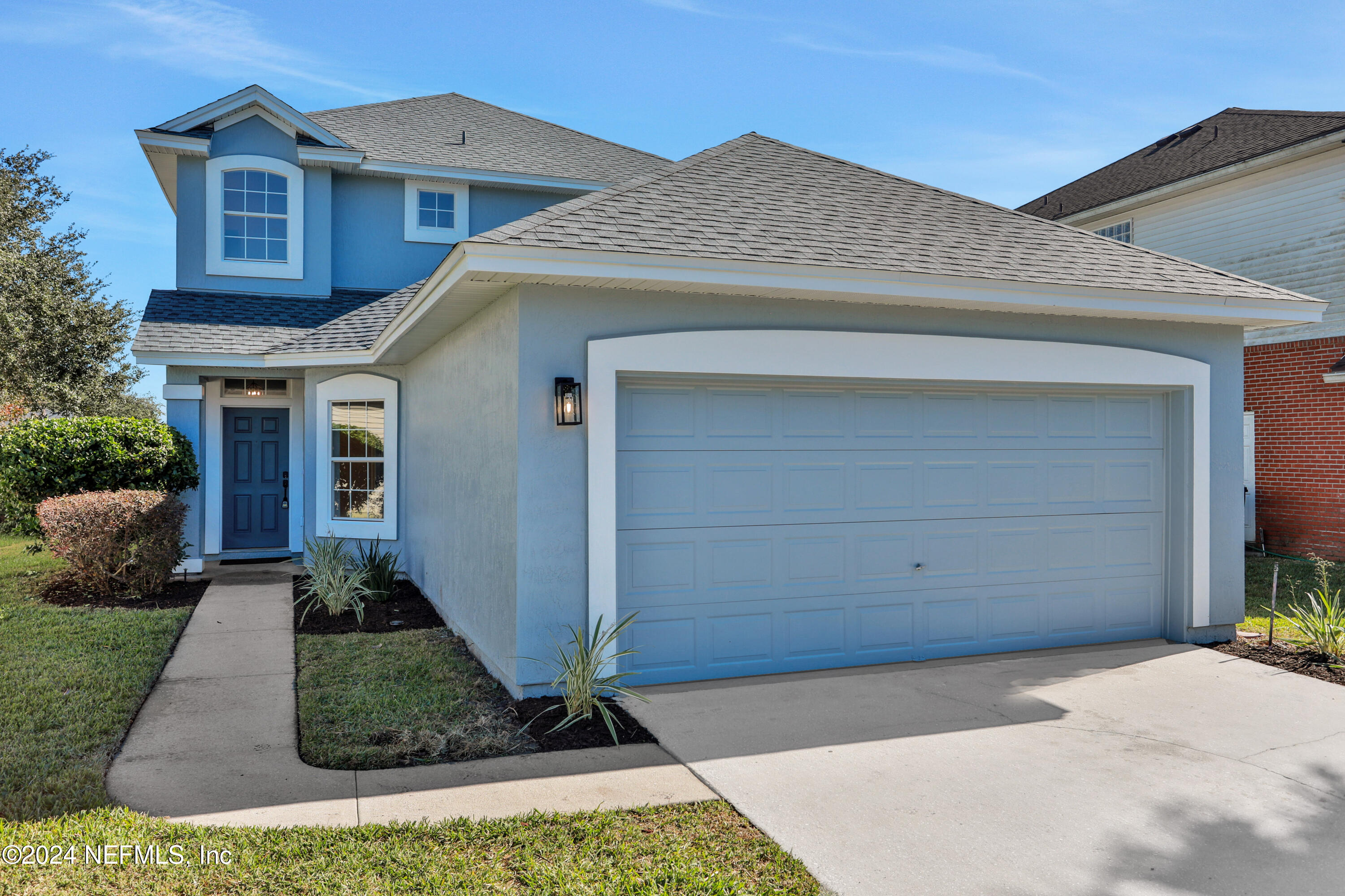 a front view of house with yard