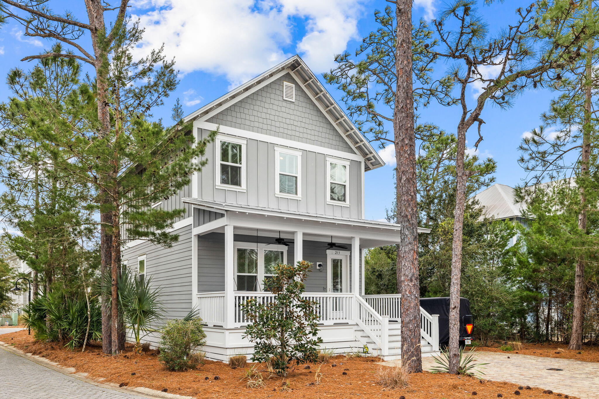 front view of a house with a yard