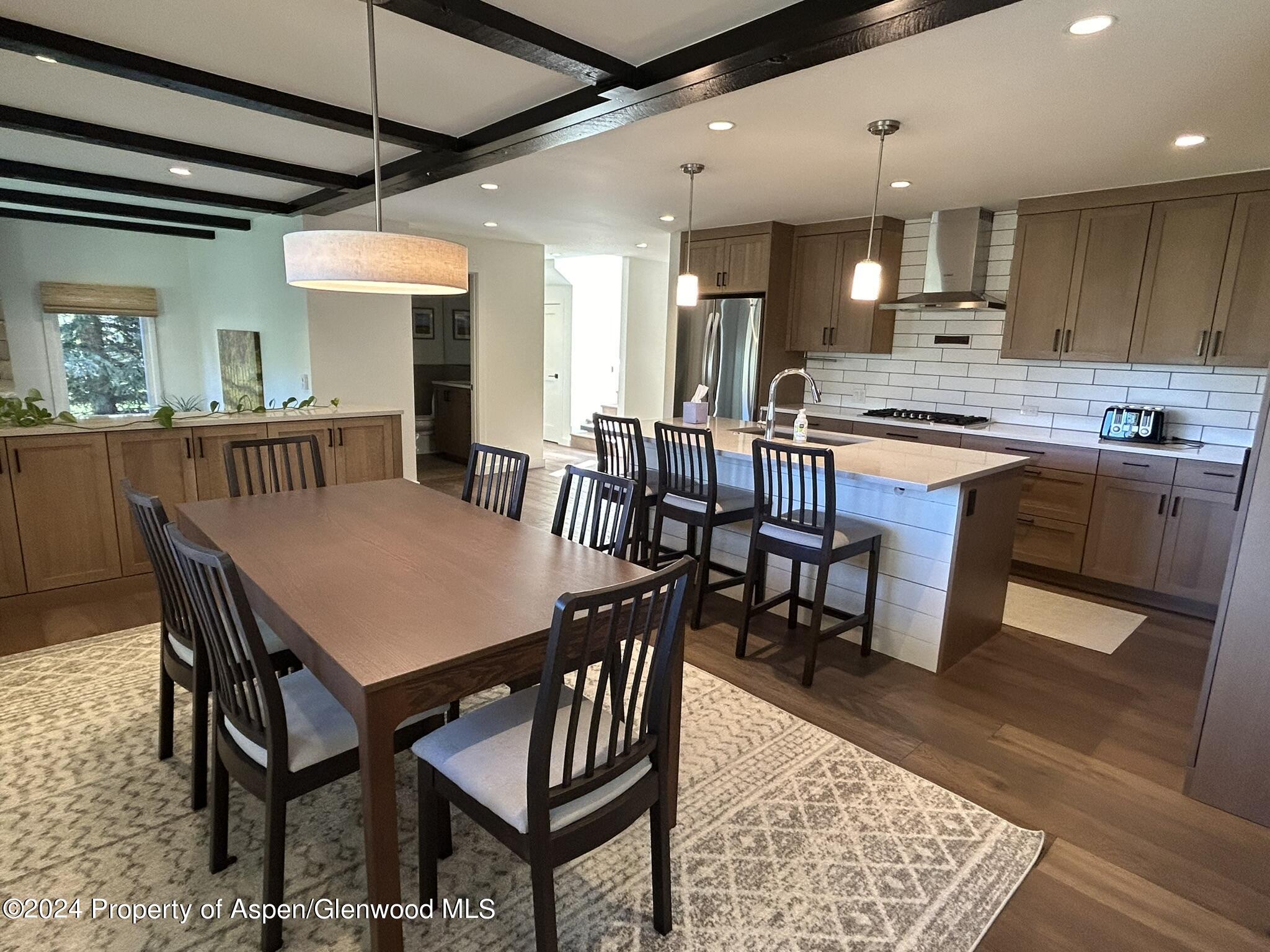 a view of a dining room with furniture