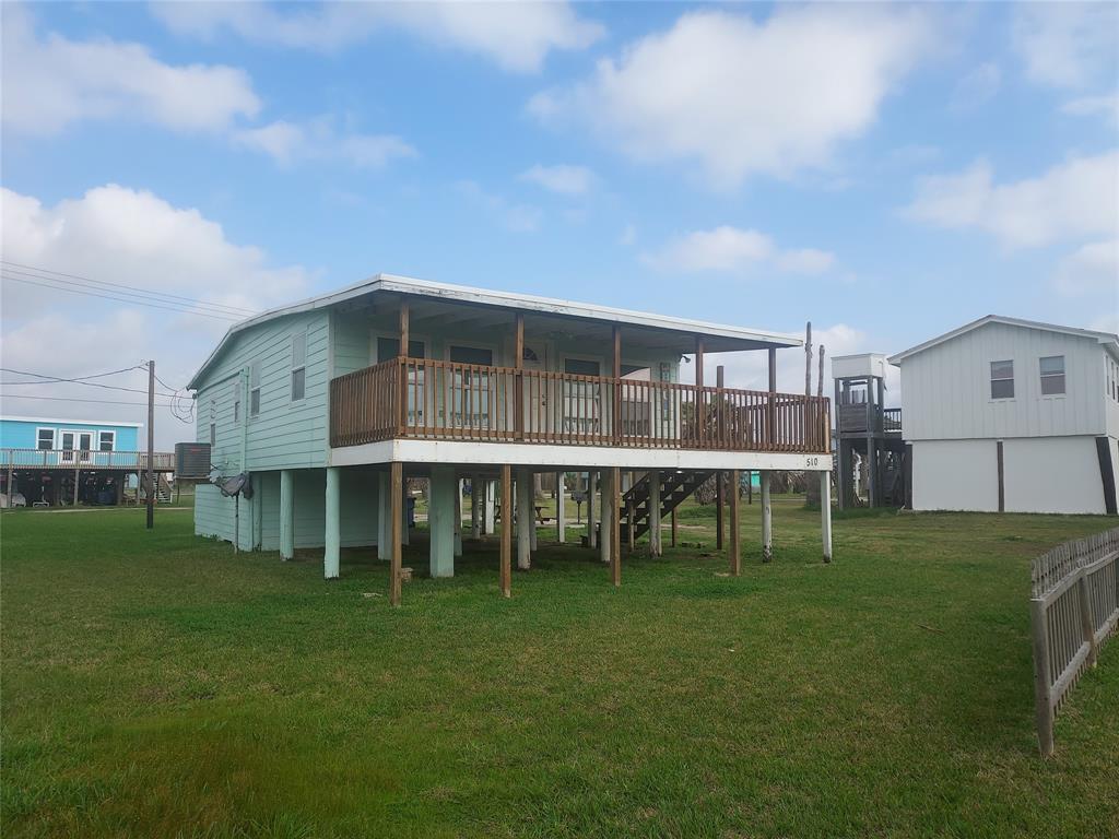 a view of house with a garden