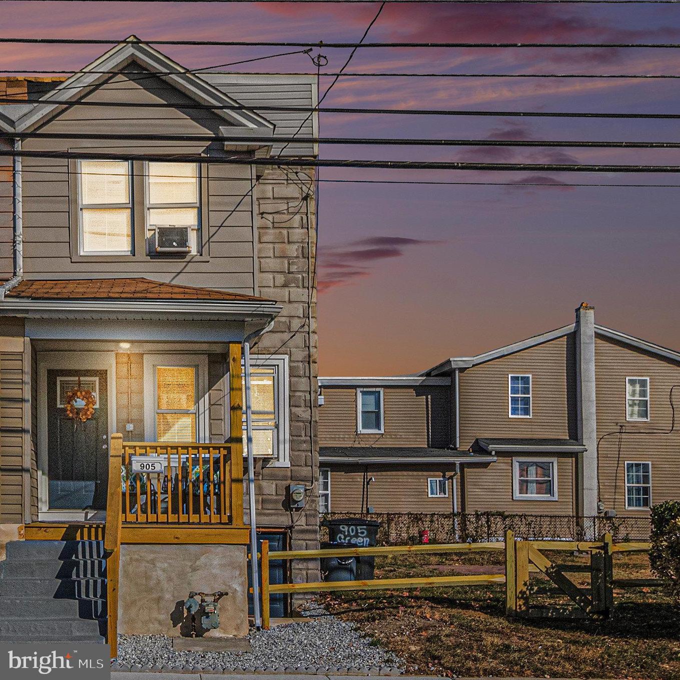 a front view of a house with a porch