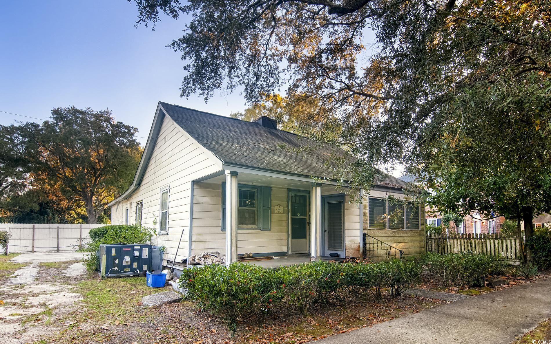 Bungalow-style home with a porch