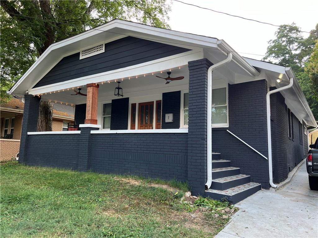 a front view of house with yard