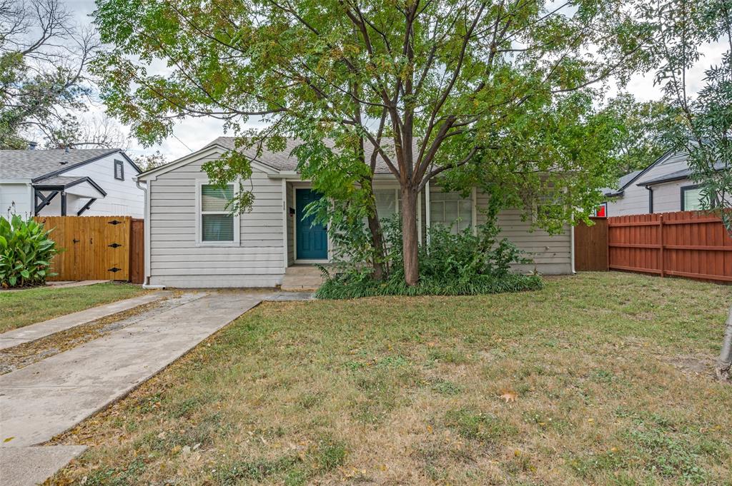 a house with trees in front of it