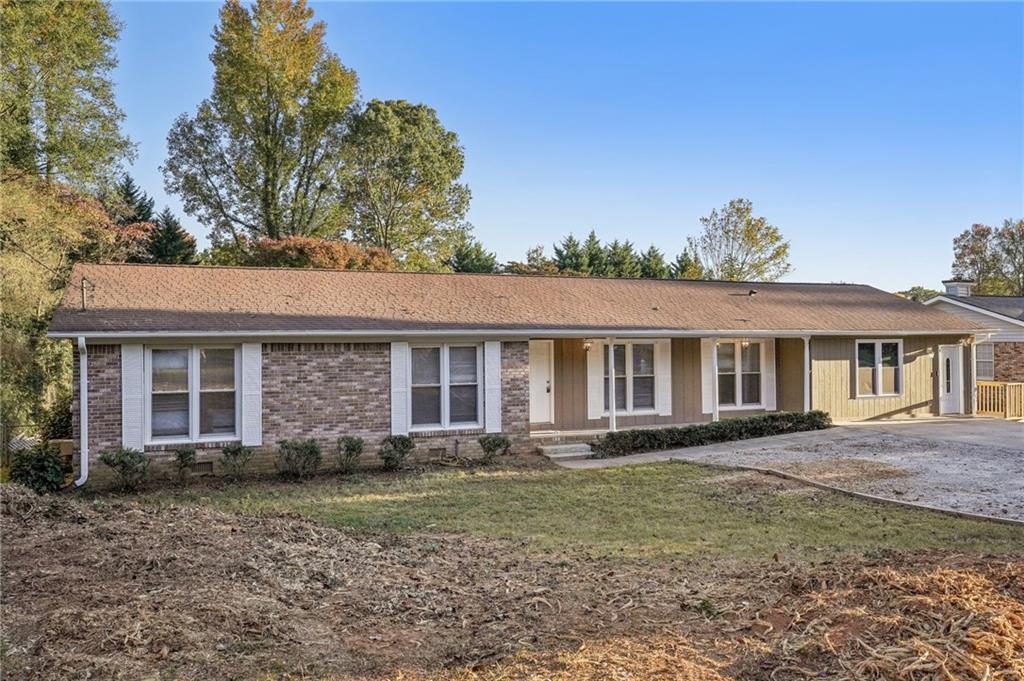 front view of a house with a yard