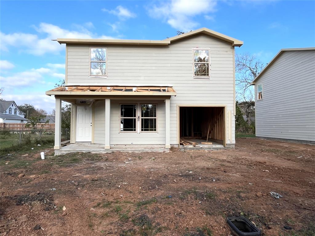 a front view of a house with a garage