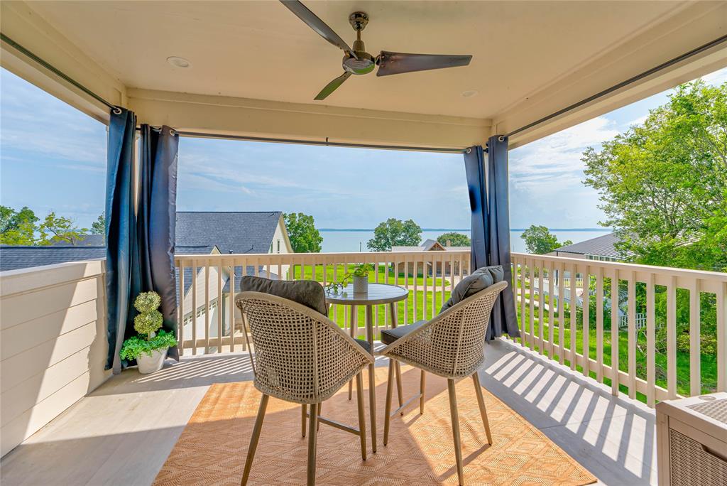 a view of two chairs in balcony