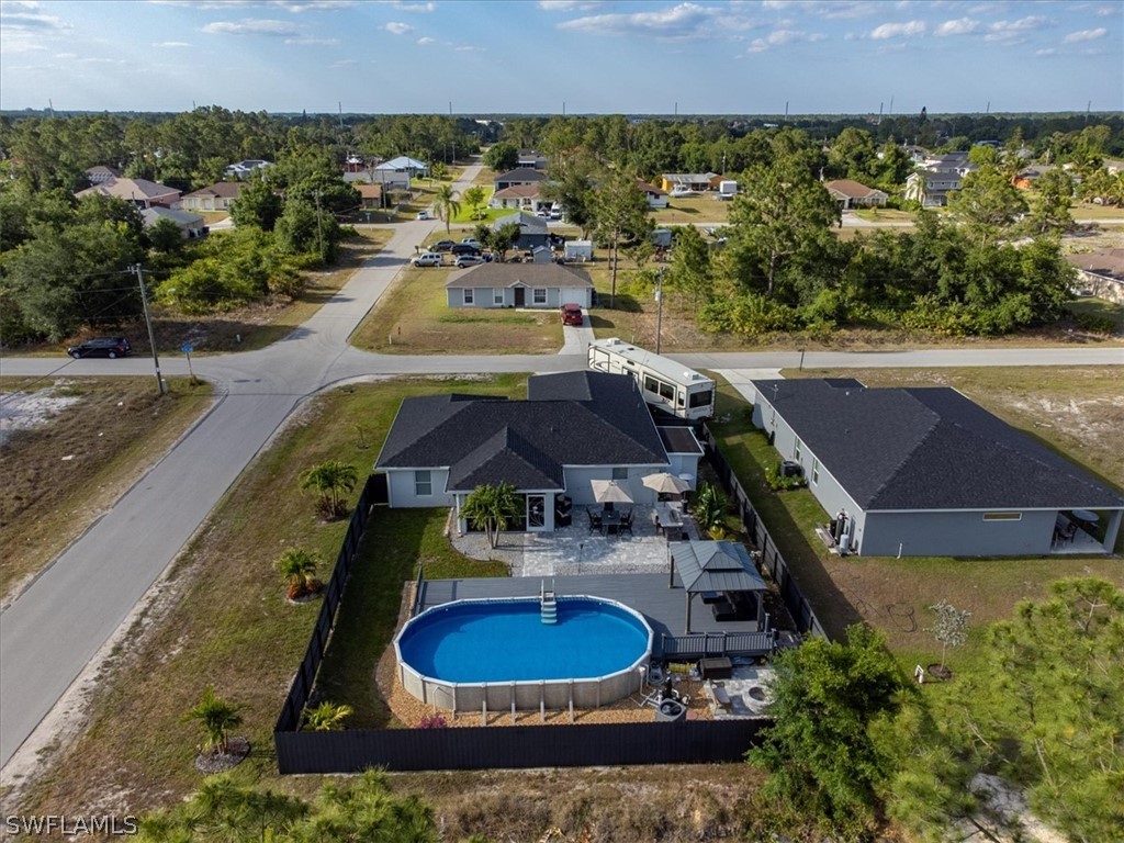 an aerial view of a house with outdoor space