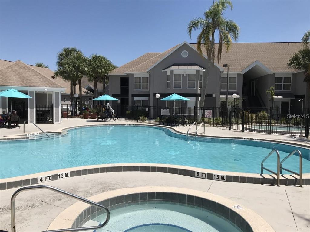 a view of a house with a swimming pool