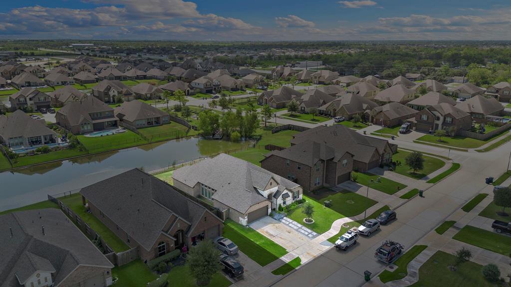 an aerial view of a house with a garden