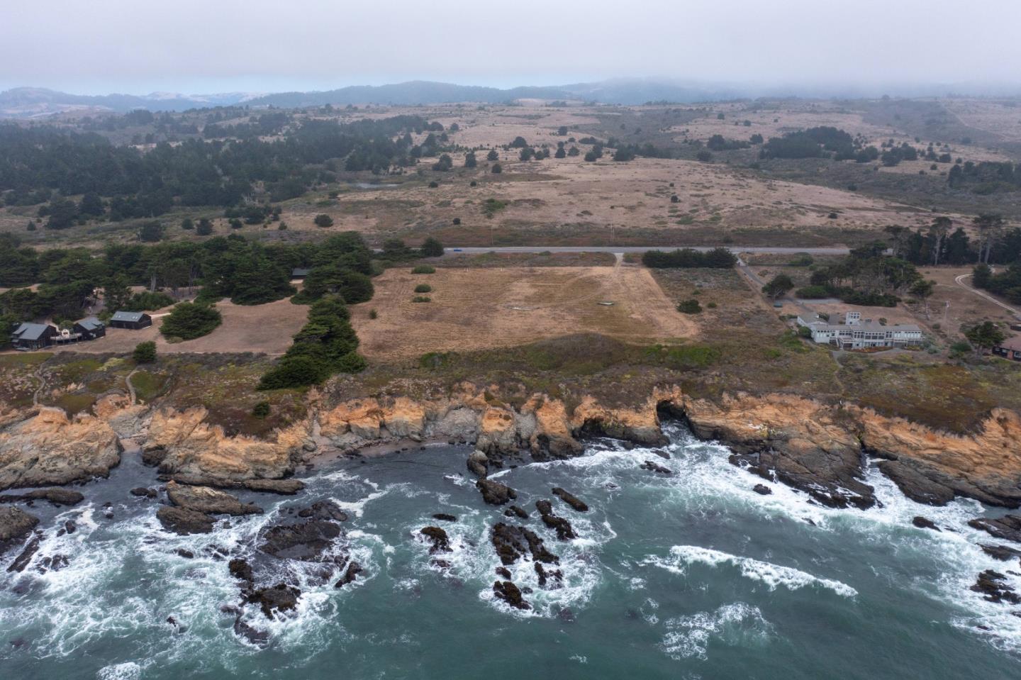 an aerial view of residential house and lake view