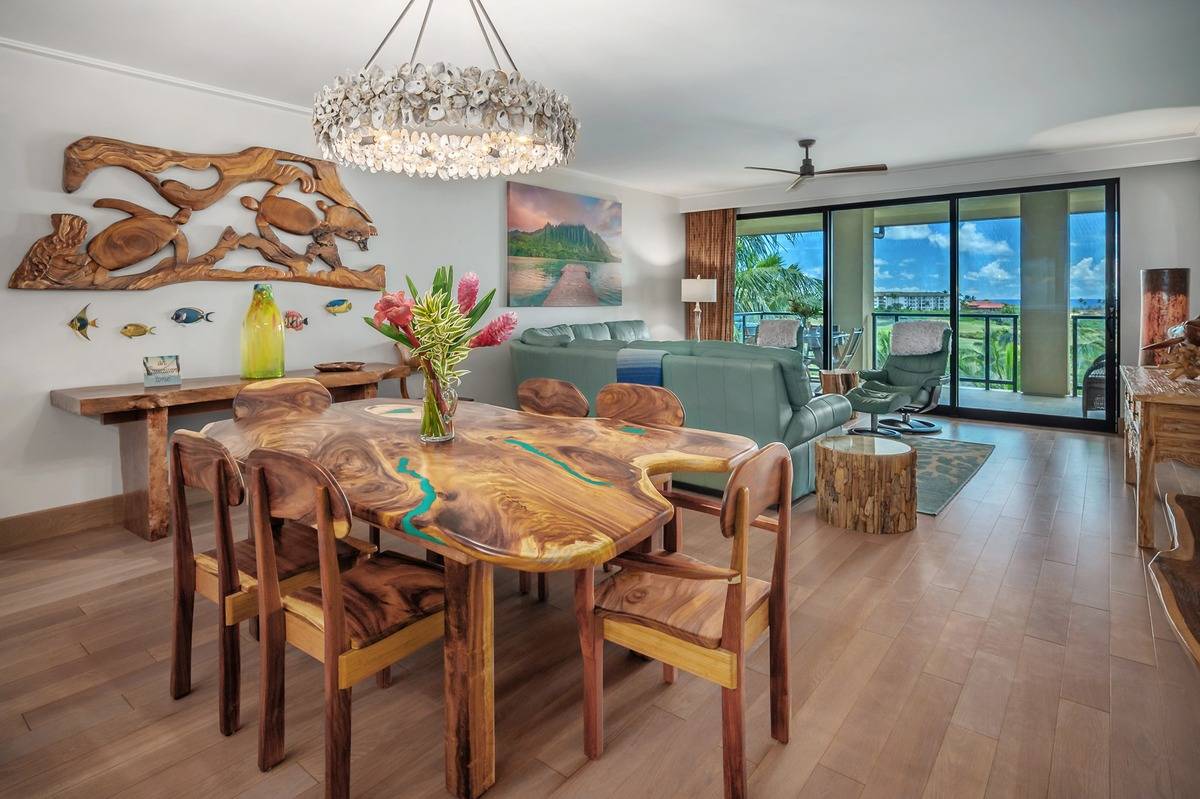 a view of a dining room with furniture window and outside view