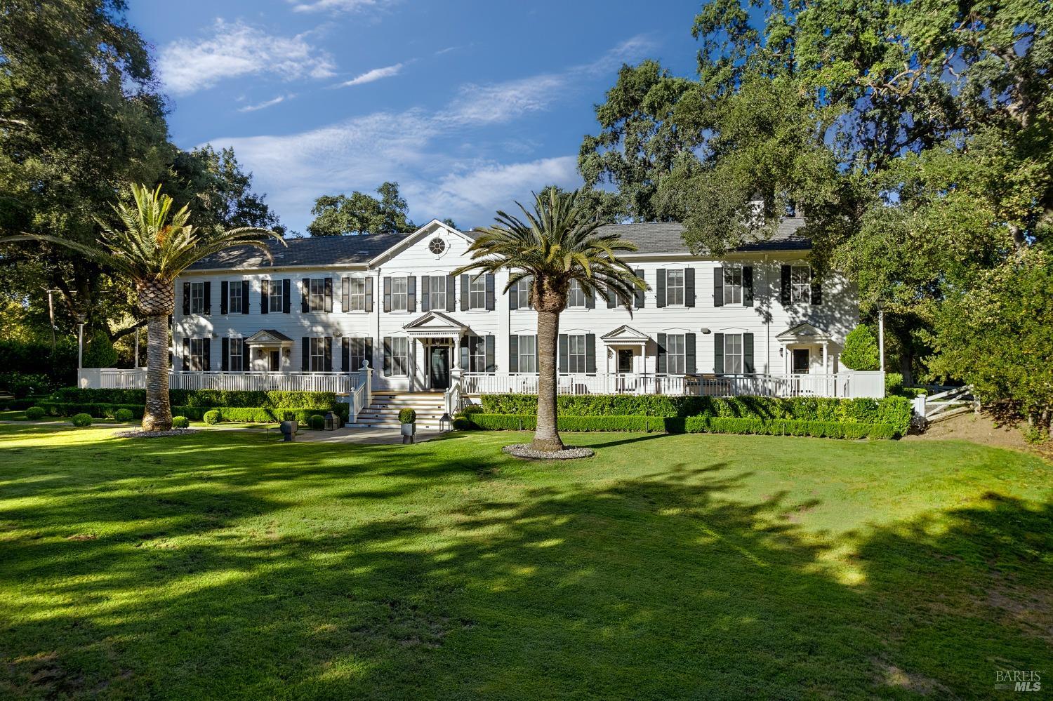 a view of a house with a big yard