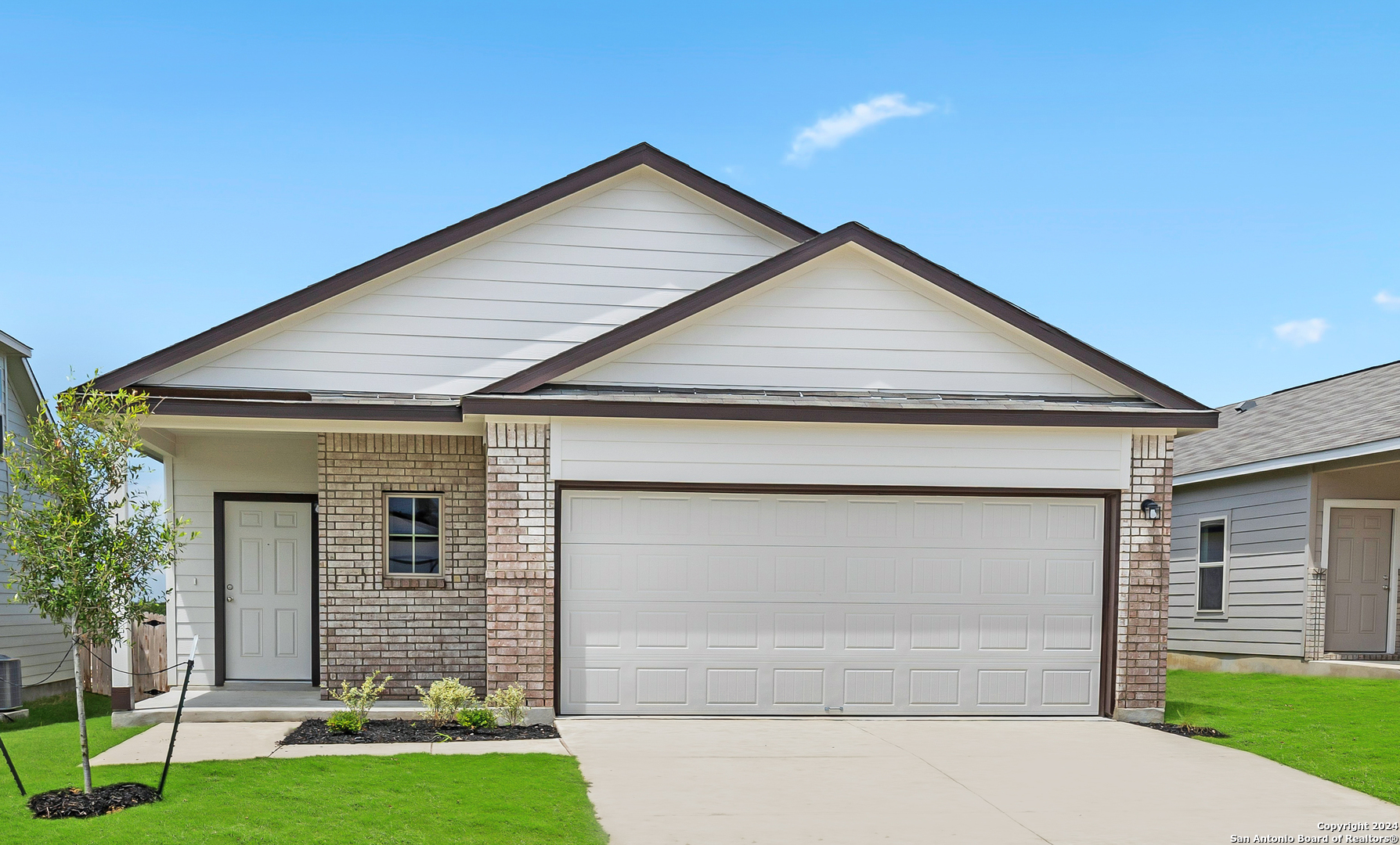 a front view of house with yard