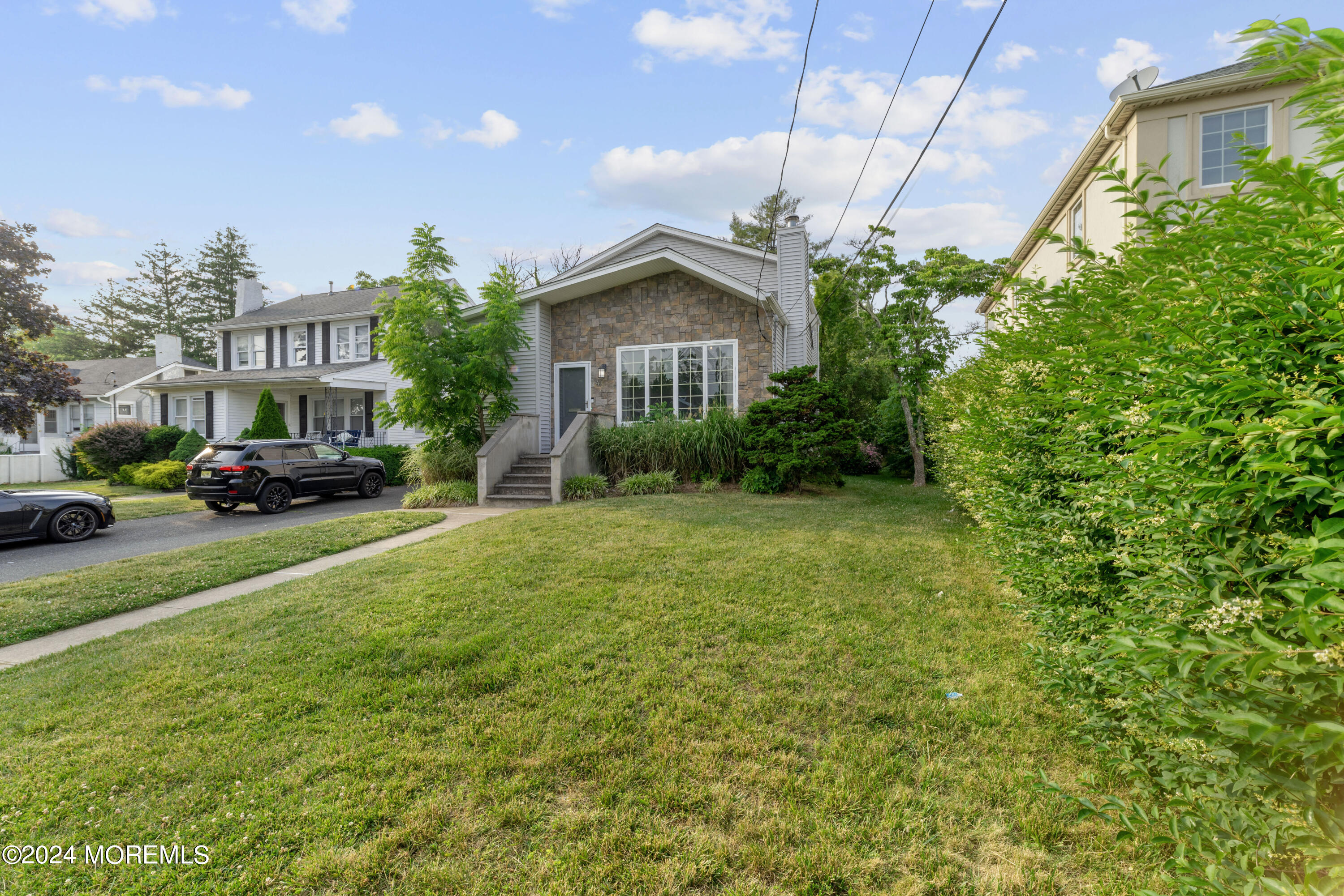 a house view with a garden space