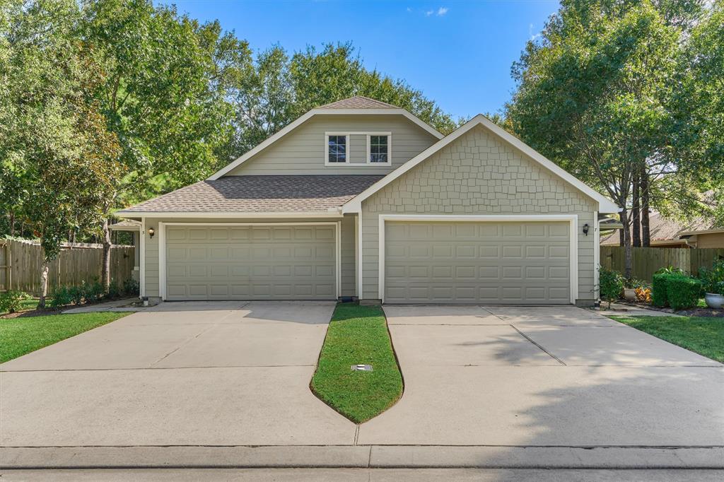 a front view of a house with garage