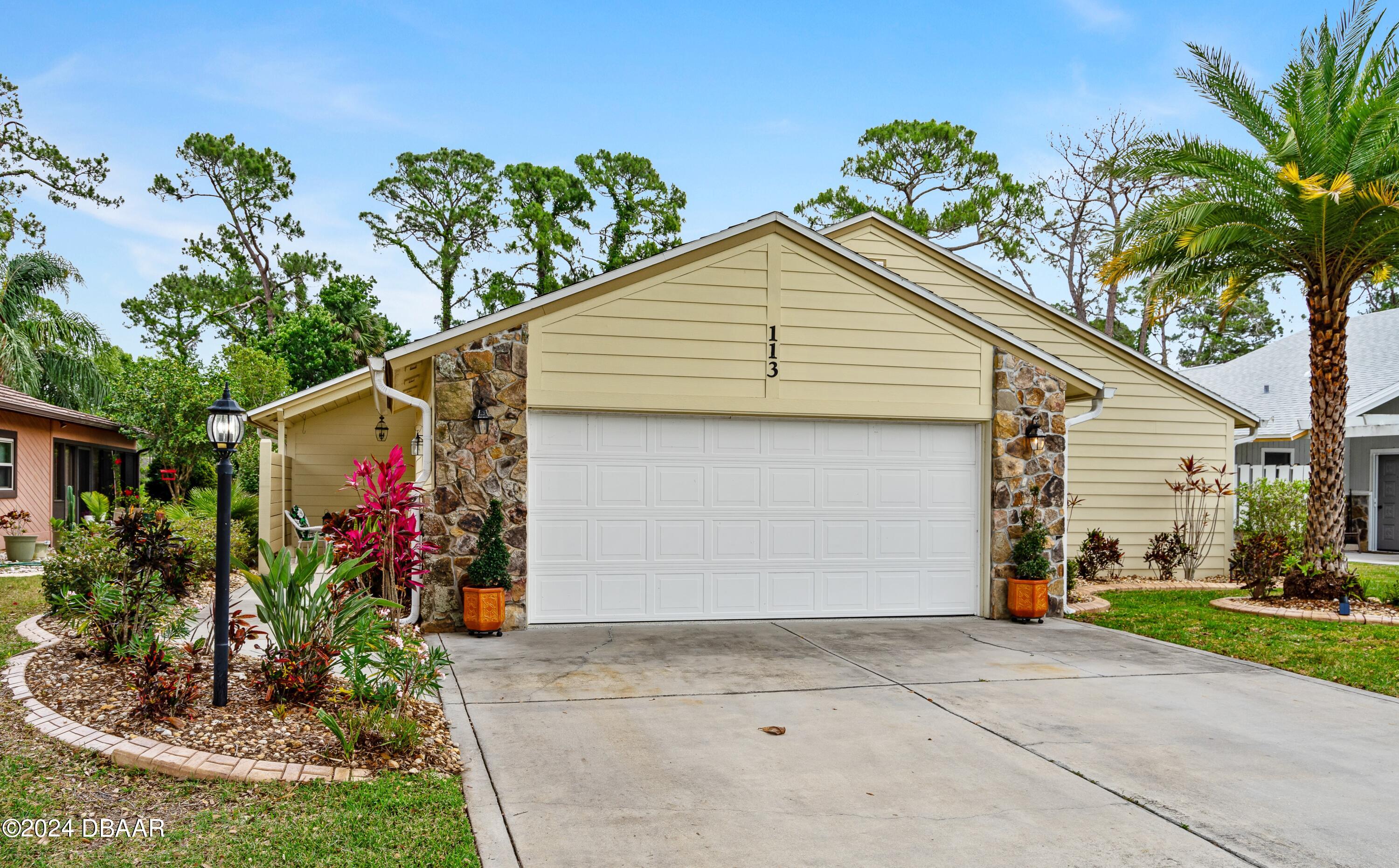 a front view of house with yard