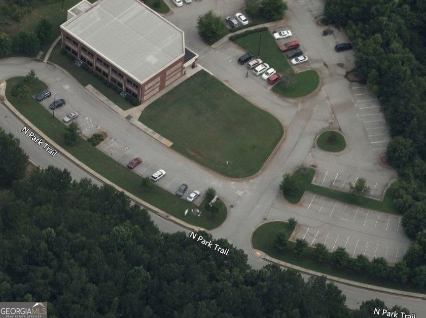 an aerial view of house with yard