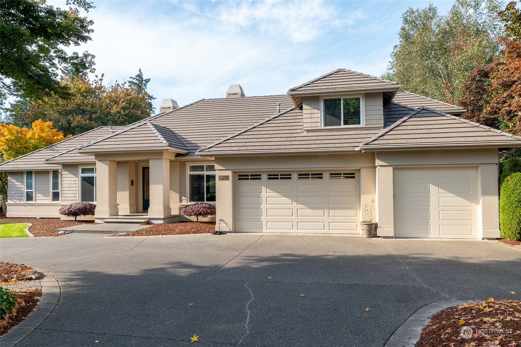 a front view of a house with a outdoor space