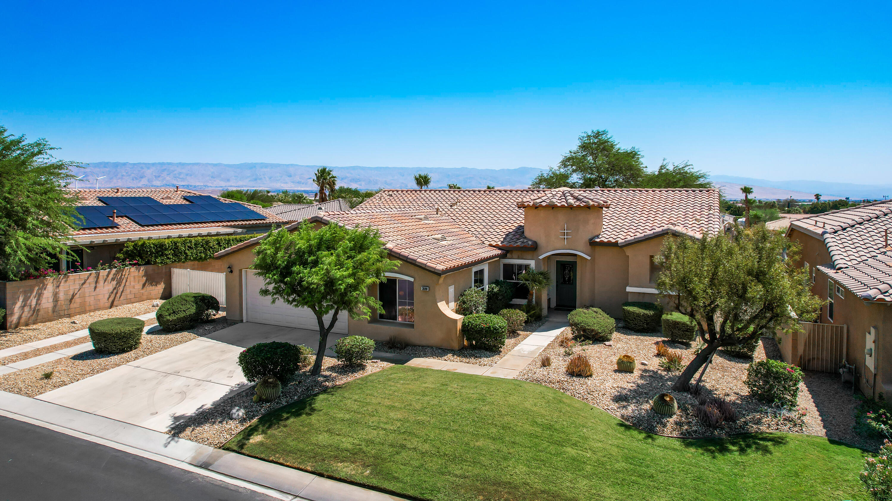 a view of a house with patio outdoor seating