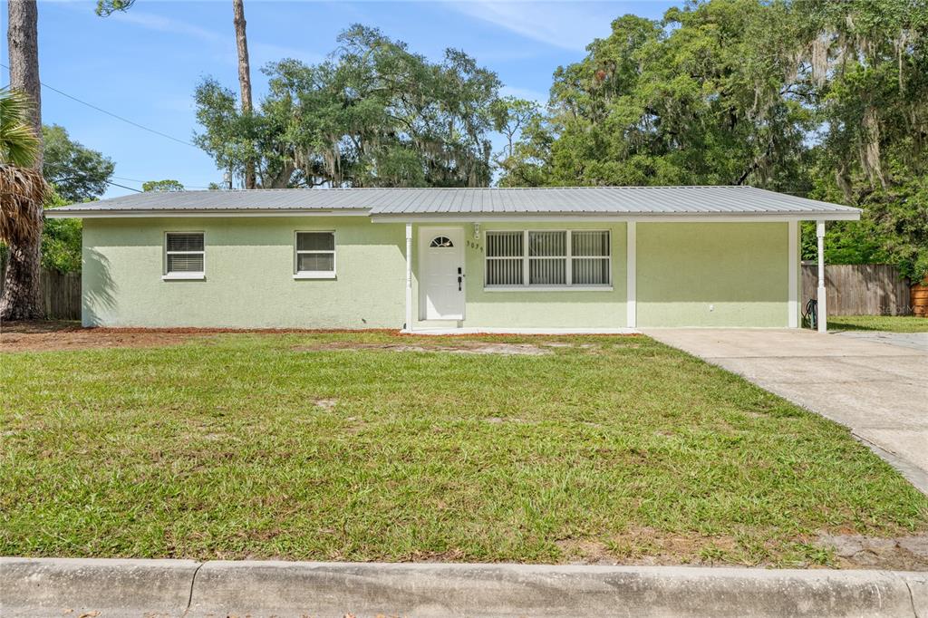 front view of house with a yard