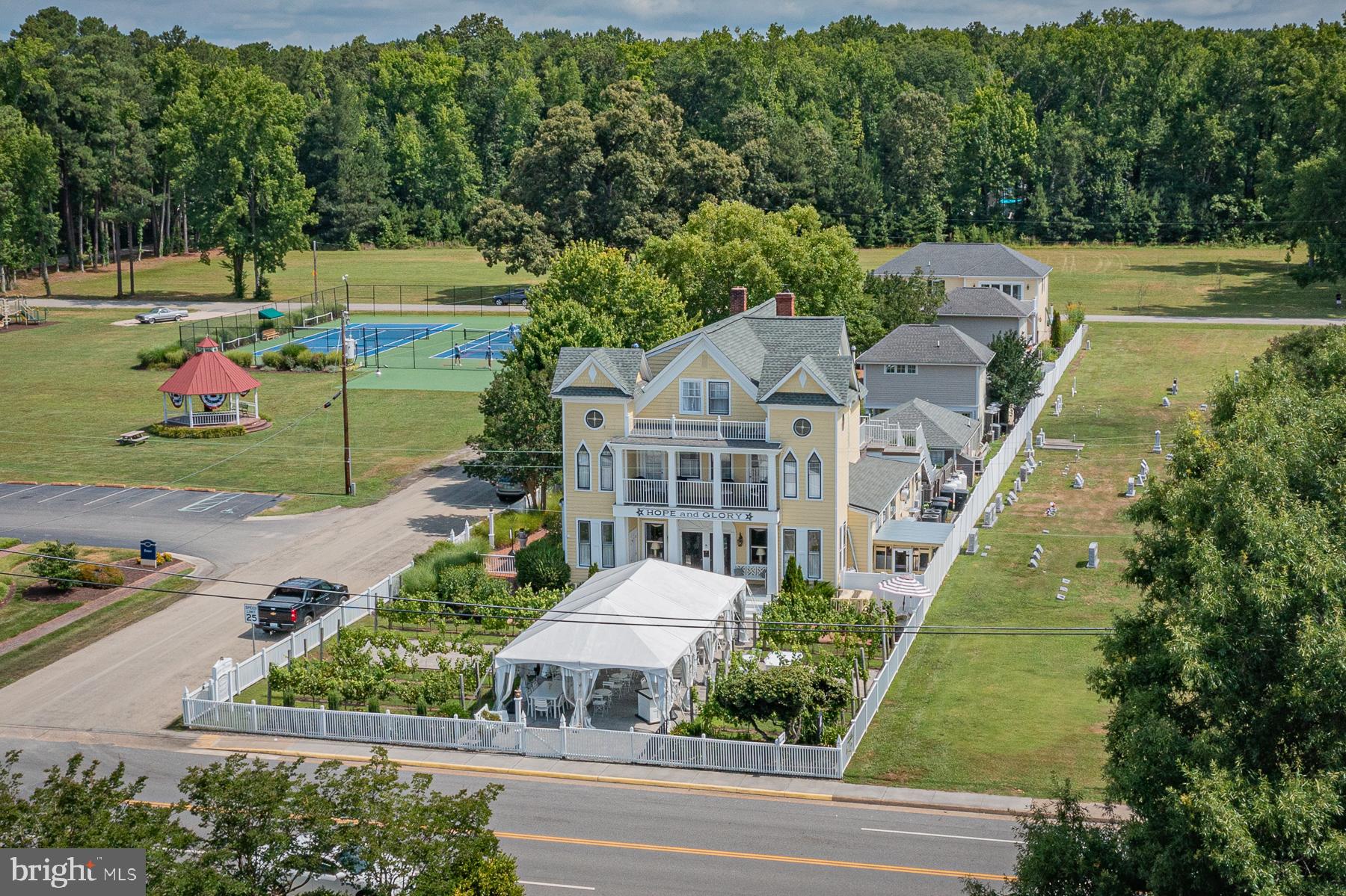 an aerial view of a house with a garden