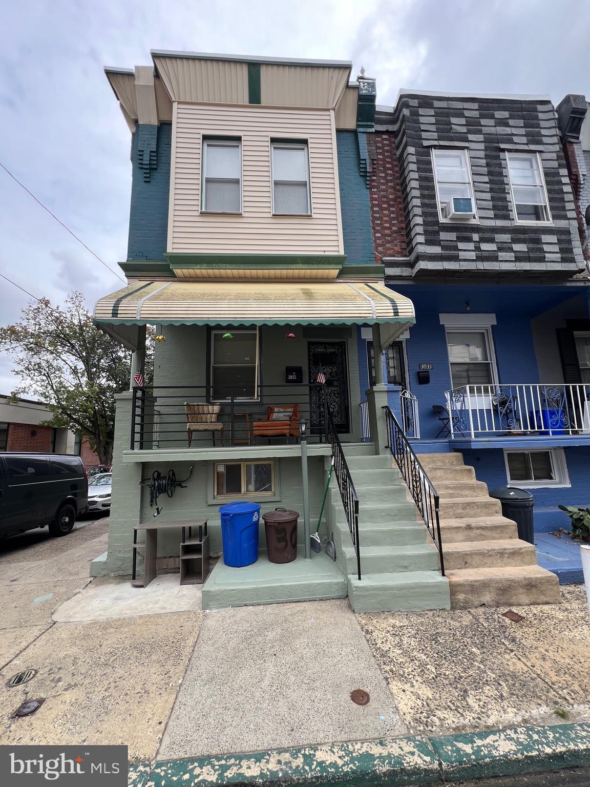 a view of a building with car parked