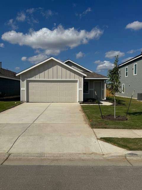 a view of house with yard