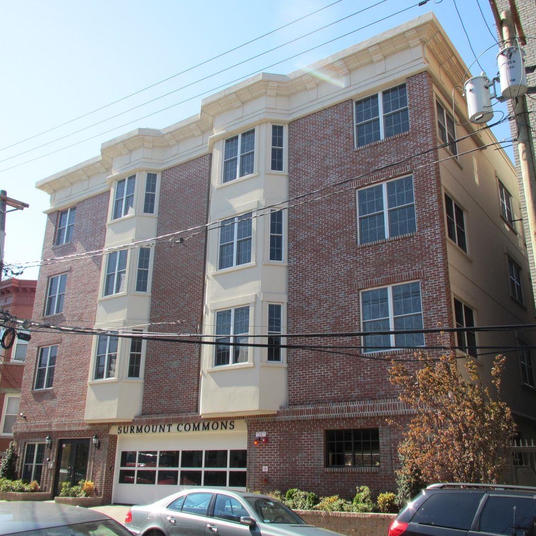 a front view of a building with balcony