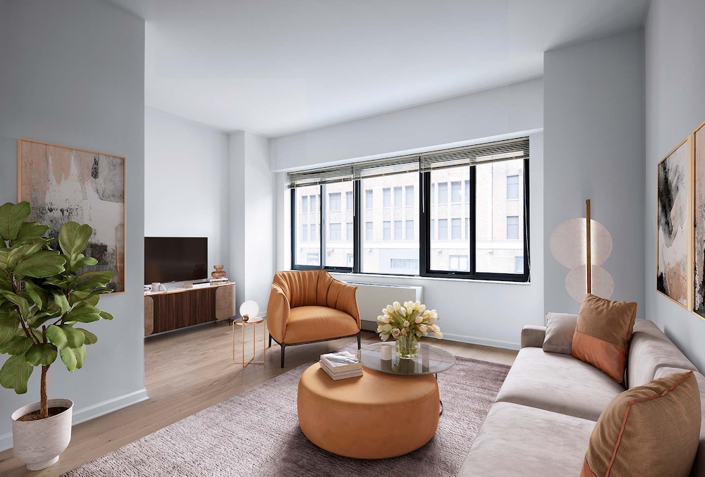 a living room with furniture windows and a flat screen tv