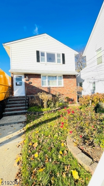 a front view of house with yard