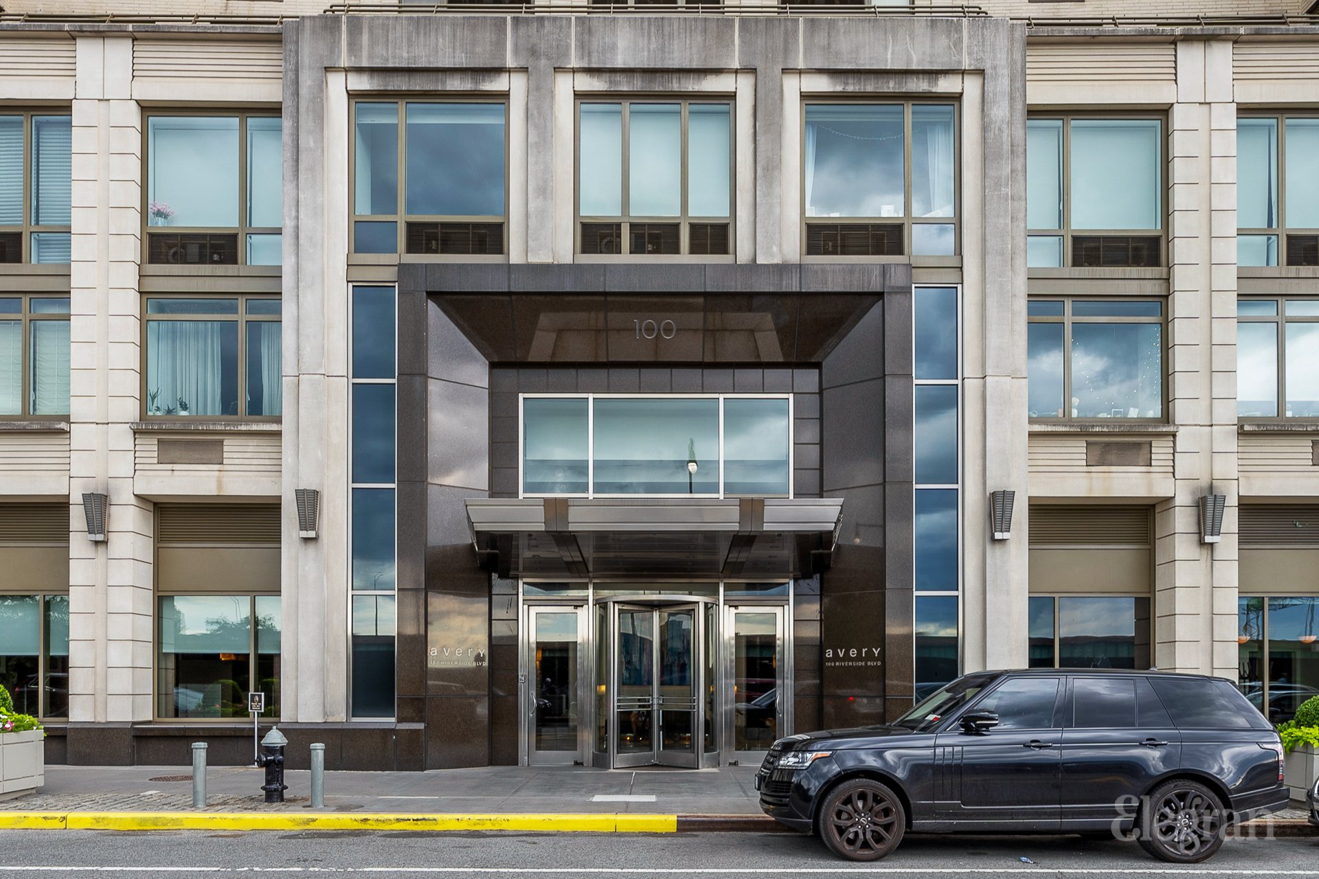 a car parked in front of a building