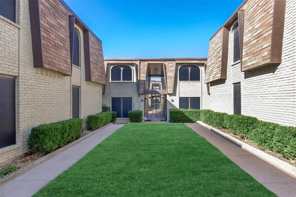 a house view with a garden space