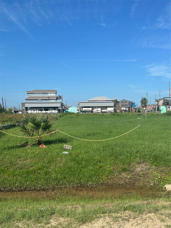 a view of a golf course with a building