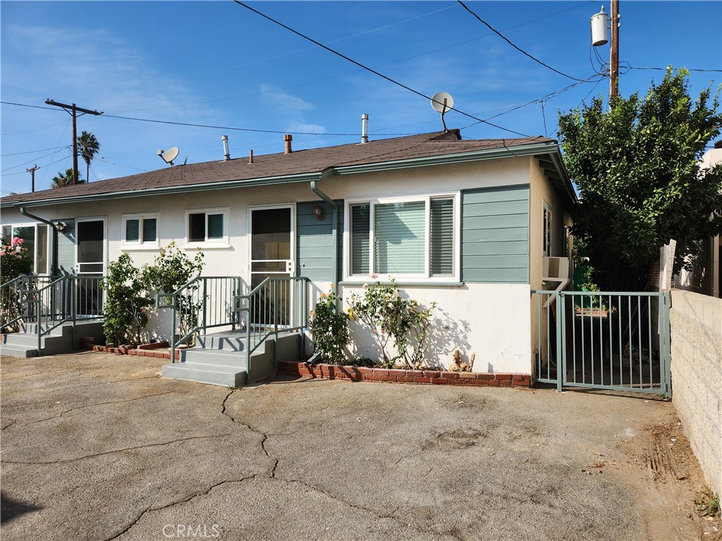 a front view of a house with yard