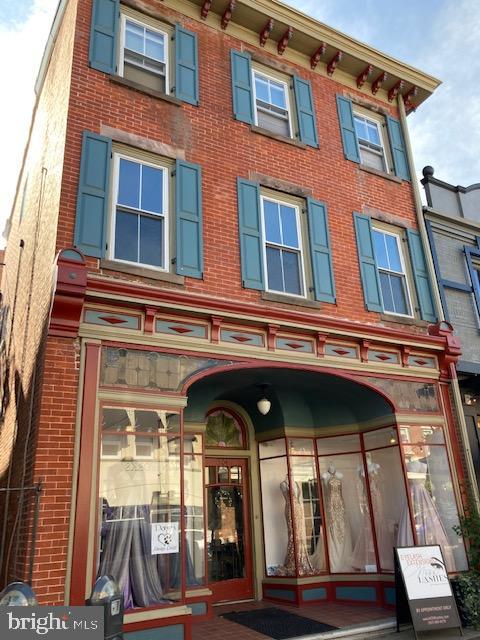 a view of building with a balcony