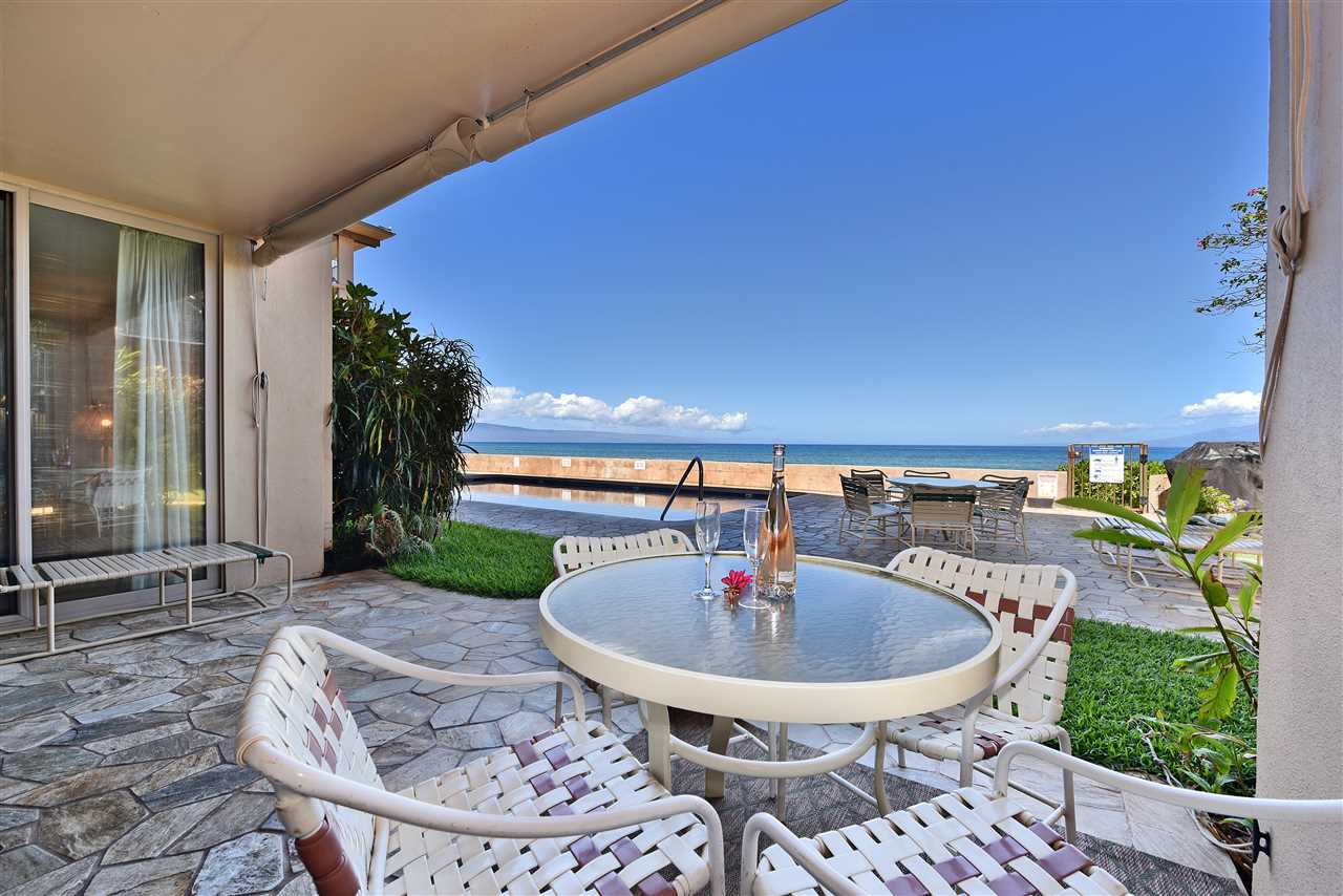 a table and chairs in a patio