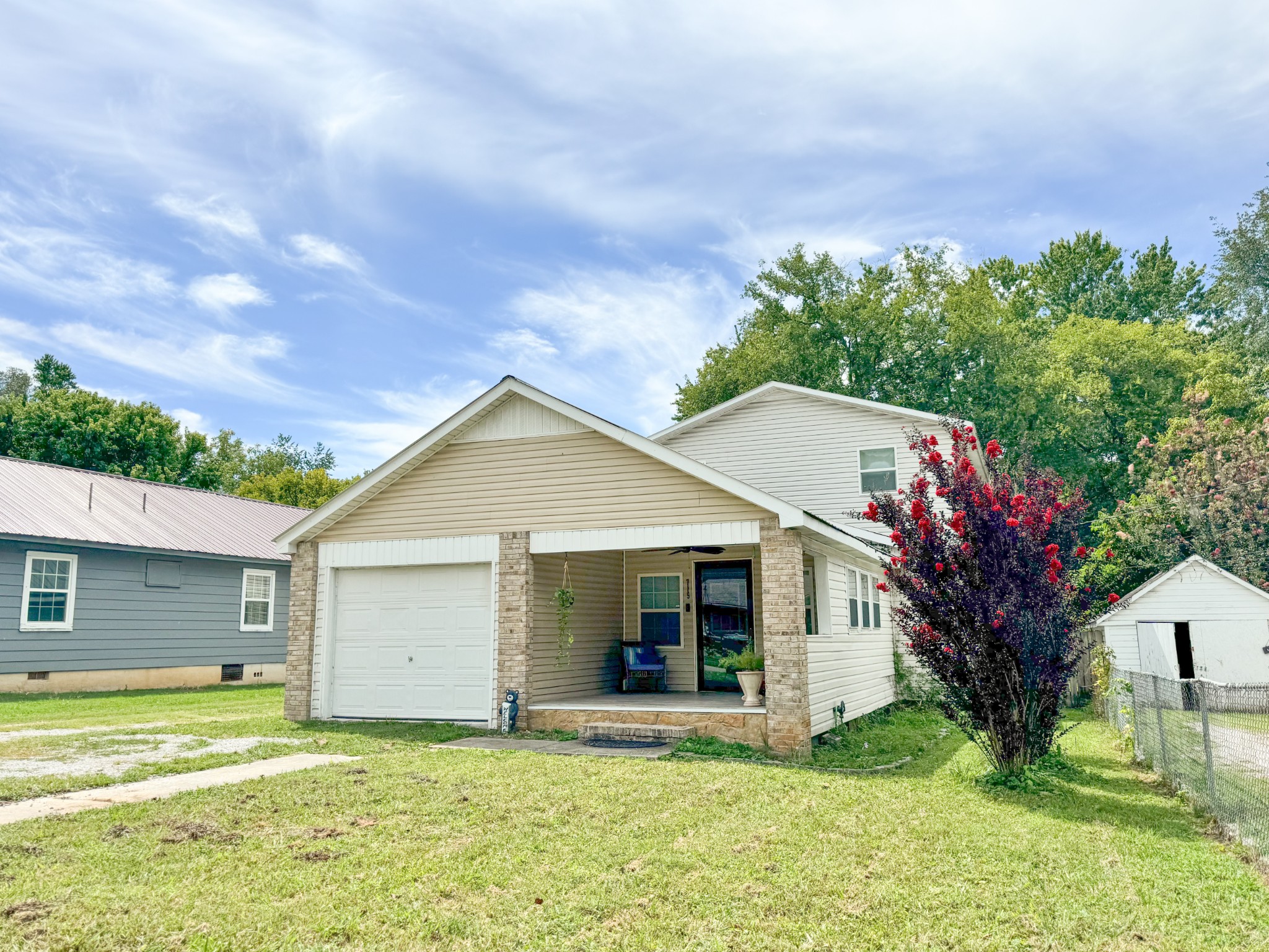 a view of a house with a yard